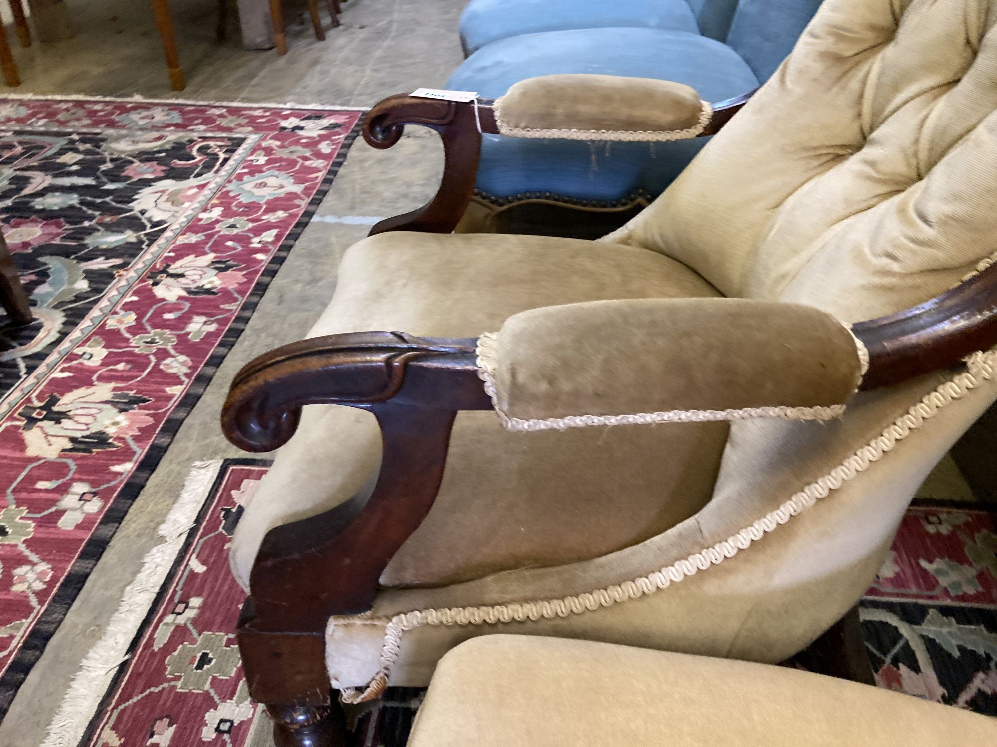 Two Victorian mahogany spoonback chairs (one with arms)